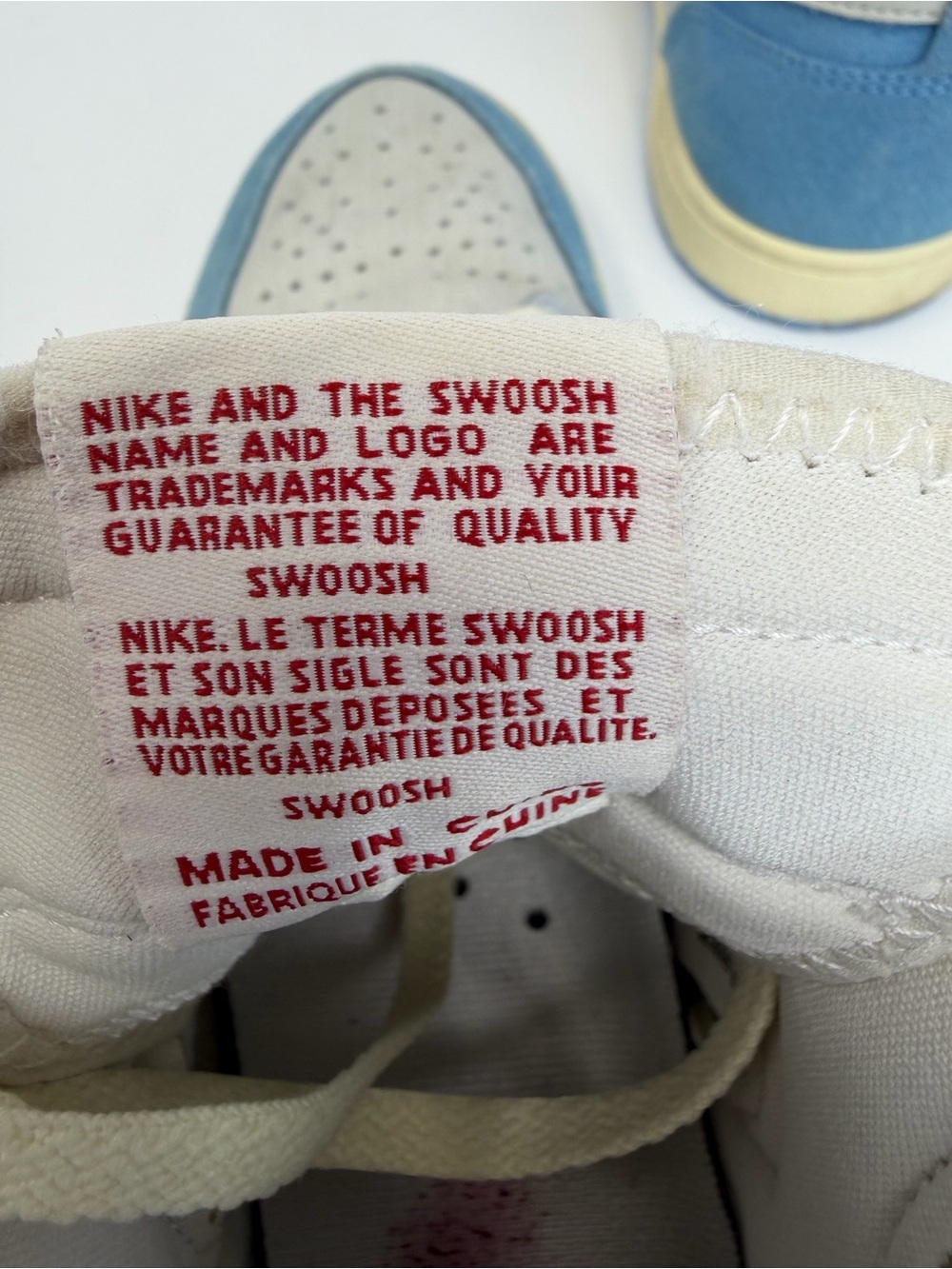 Nike High-Top Sneakers in Blue and Cream with Red Tongue Tag - Picture 8 of 9